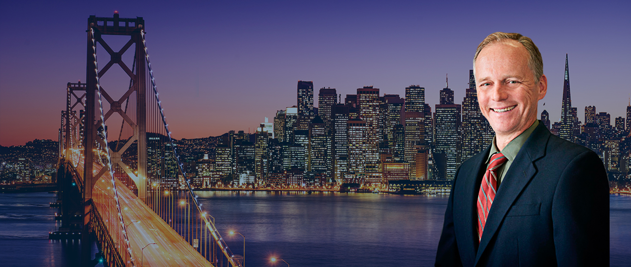 Skyline of the city of San Francisco & a picture of attorney John Stanko
